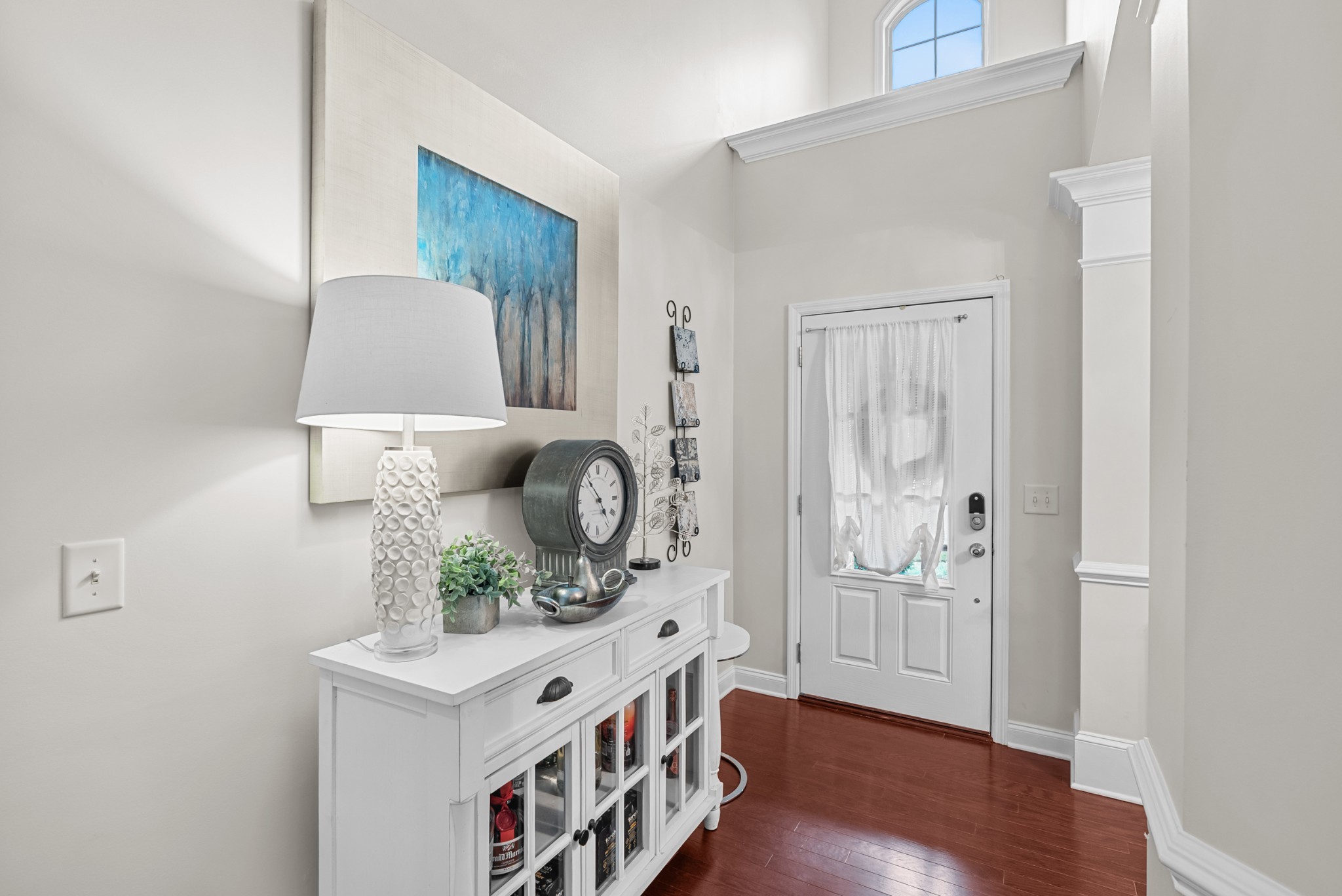 413 Marlowe Court Nolensville, TN 37135 - Photo 6 of 37 an entryway with wooden floor and cabinet