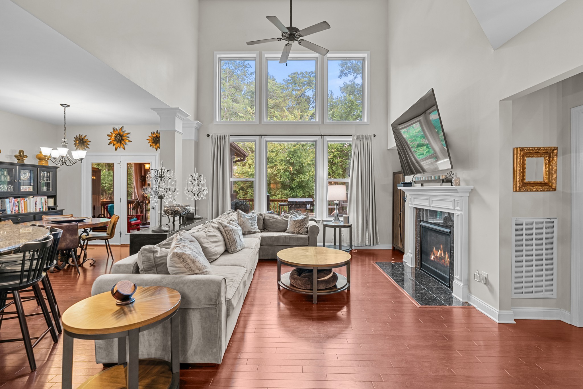 413 Marlowe Court Nolensville, TN 37135 - Photo 9 of 37 a living room with furniture a fireplace and a large window