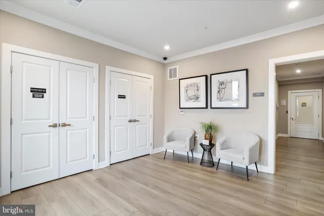 a view of a swimming pool with outdoor seating