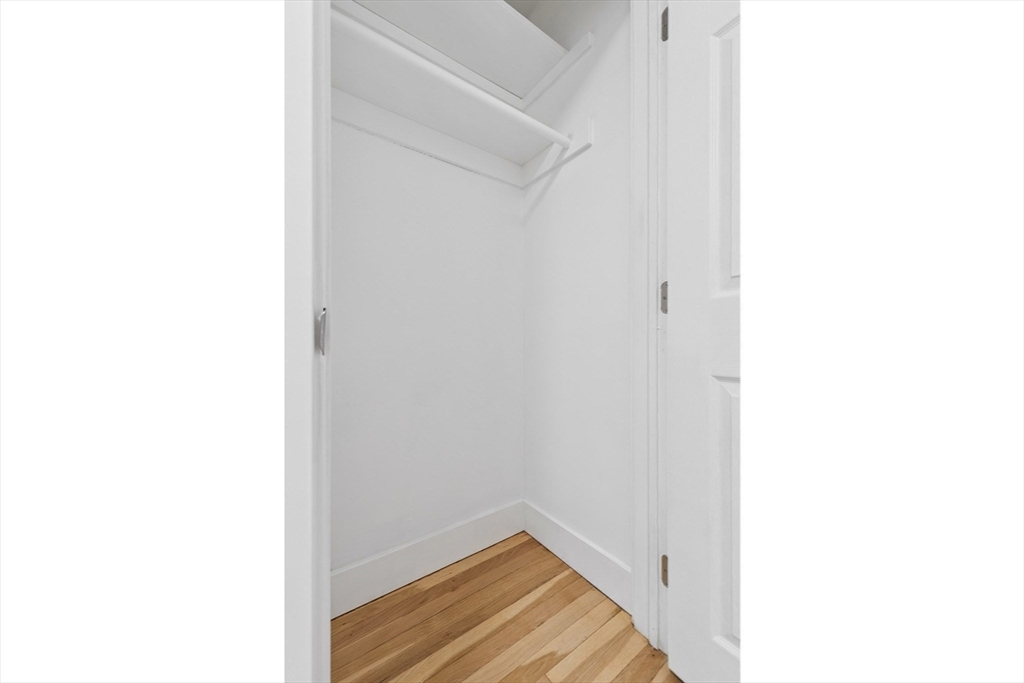 303 Broadway, Unit C2 Lynn, MA 01904 - Photo 12 of 15 a view of a hallway with closet
