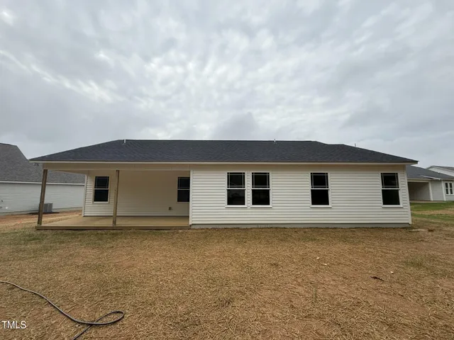 front view of house with a yard