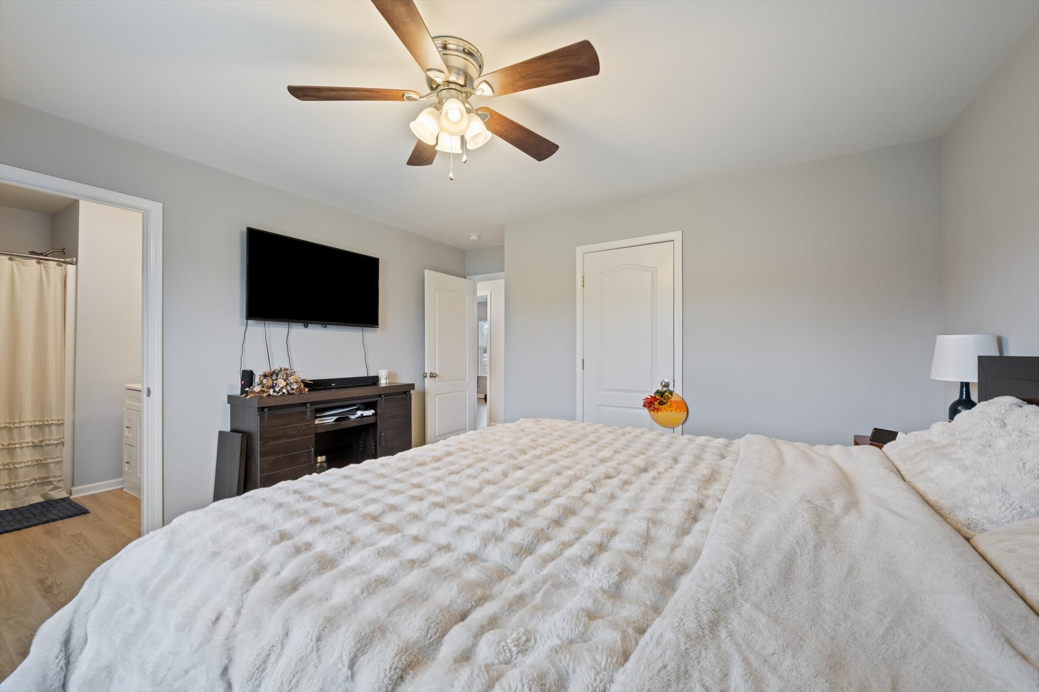 426 Edgewood Street Alexandria, TN 37012 - Photo 11 of 17 a bedroom with a bed and a flat screen tv