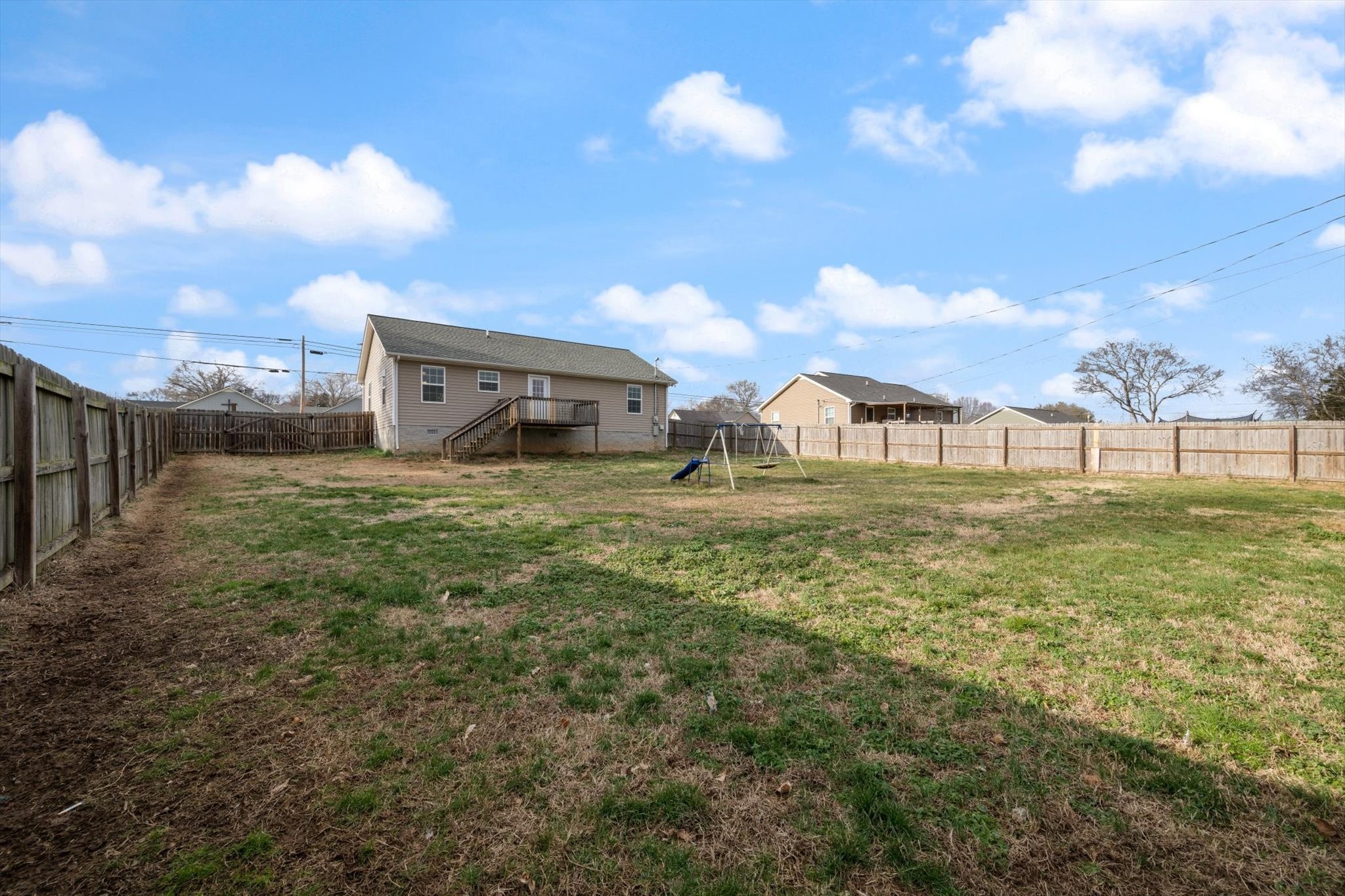 426 Edgewood Street Alexandria, TN 37012 - Photo 17 of 17 a view of a big yard with table and chairs