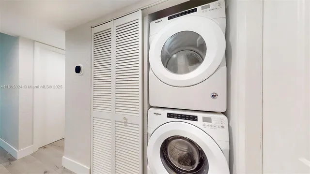 a view of sign board and tree