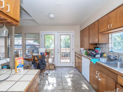 a view of a kitchen with lots of counter top space