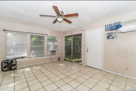 a view of an empty room and window