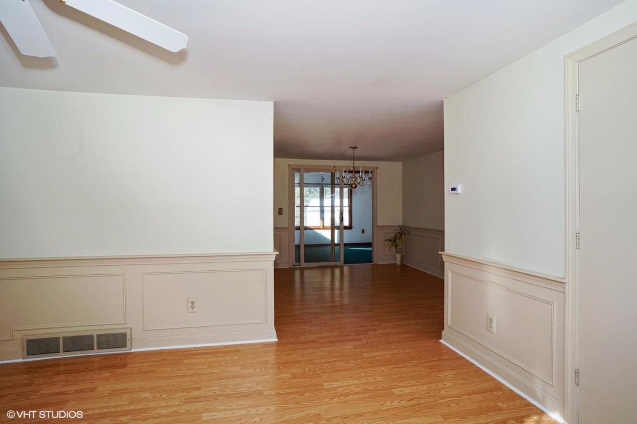 68 Cedric Road Centerville, MA 02632 - Photo 8 of 15 a view of empty room with wooden floor and fan