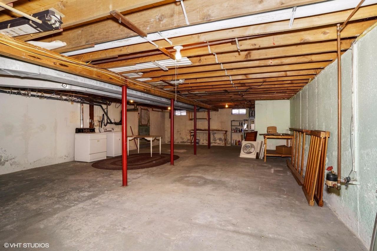 68 Cedric Road Centerville, MA 02632 - Photo 9 of 15 a view of a big room with staircase