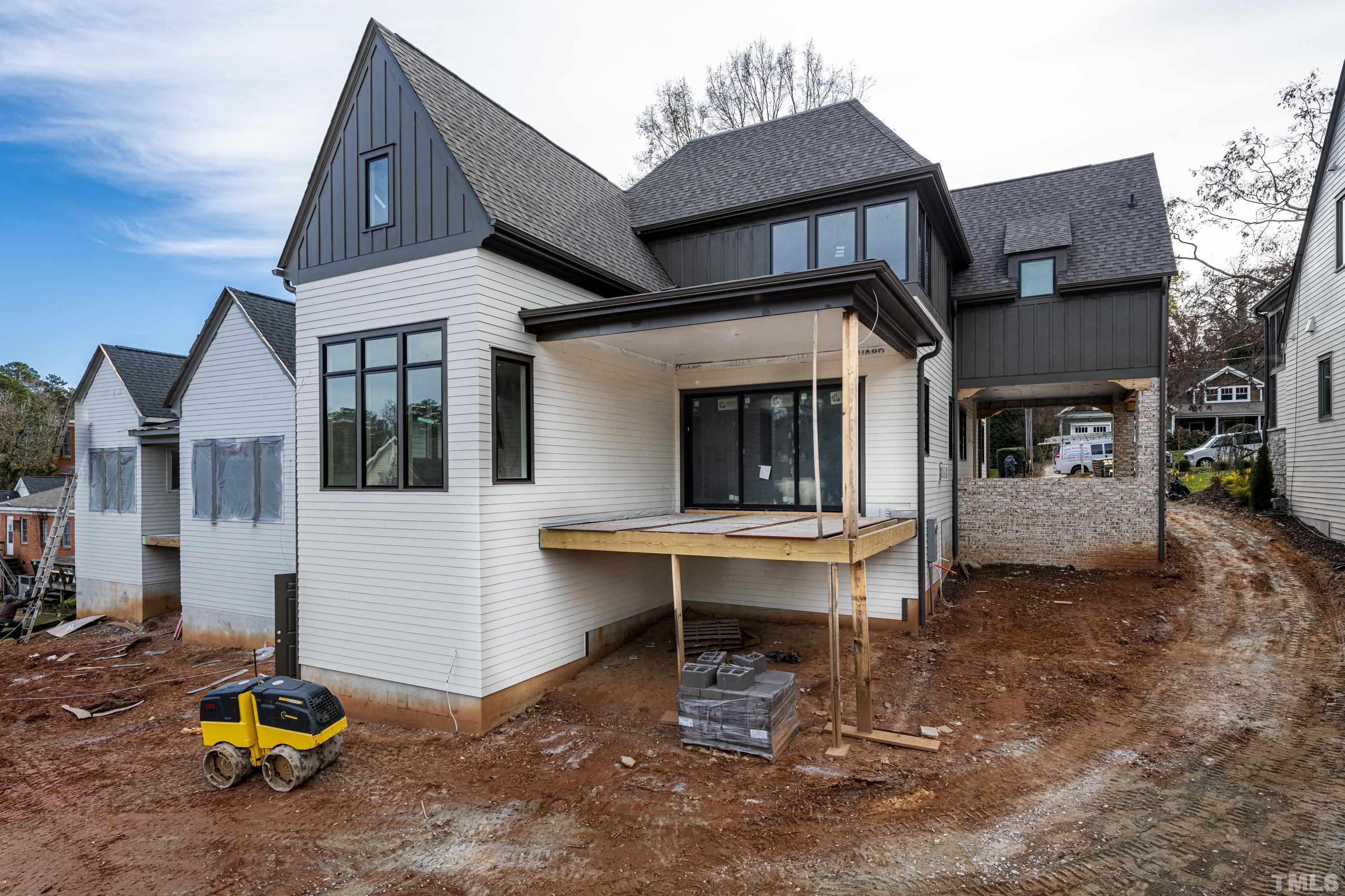 3020 Farrior Road Raleigh, NC 27607 - Photo 17 of 17 a view of a house with backyard and sitting area