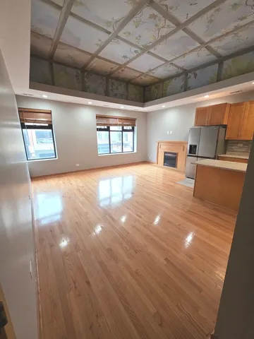 a view of a livingroom with a fireplace