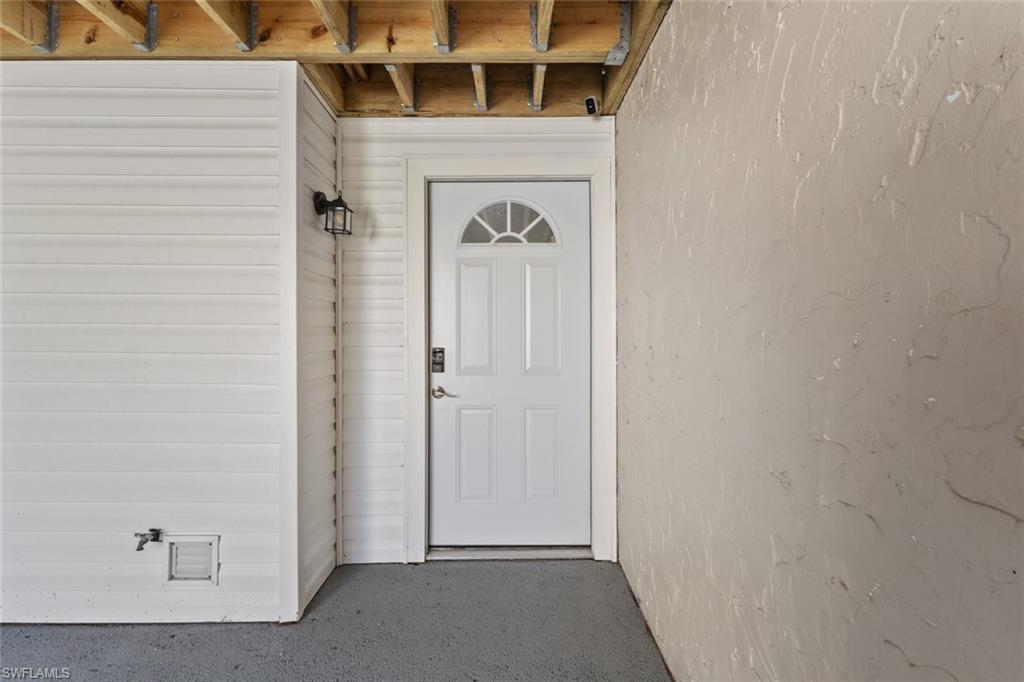 452 Bristle Cone Lane, Unit 27 Naples, FL 34113 - Photo 2 of 16 View of exterior entry