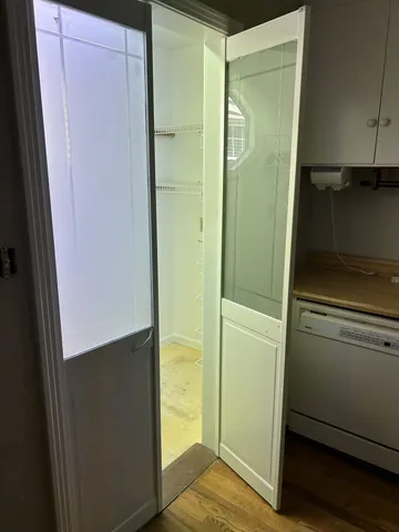 a bathroom with a shower and a sink