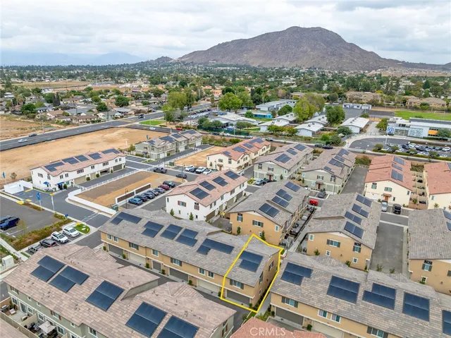 an aerial view of residential house with outdoor space