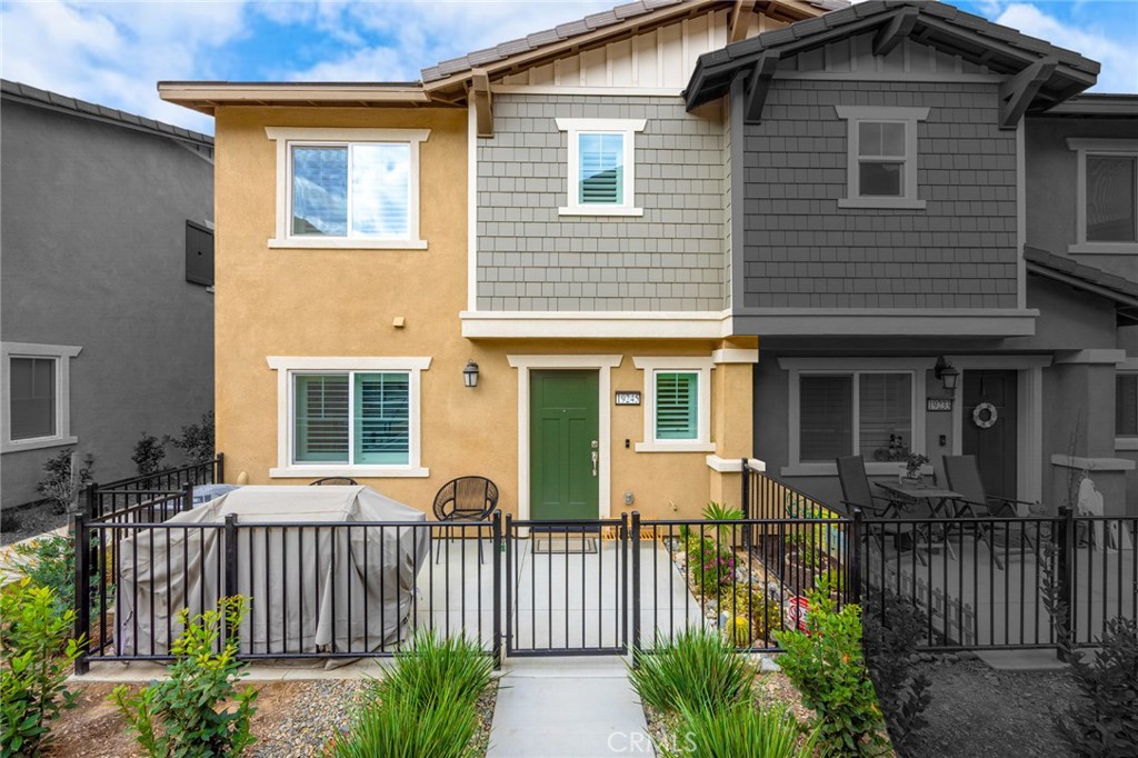 19245 Sequoia Grv Street Riverside, CA 92507 - Photo 24 of 25 a front view of a house with a porch