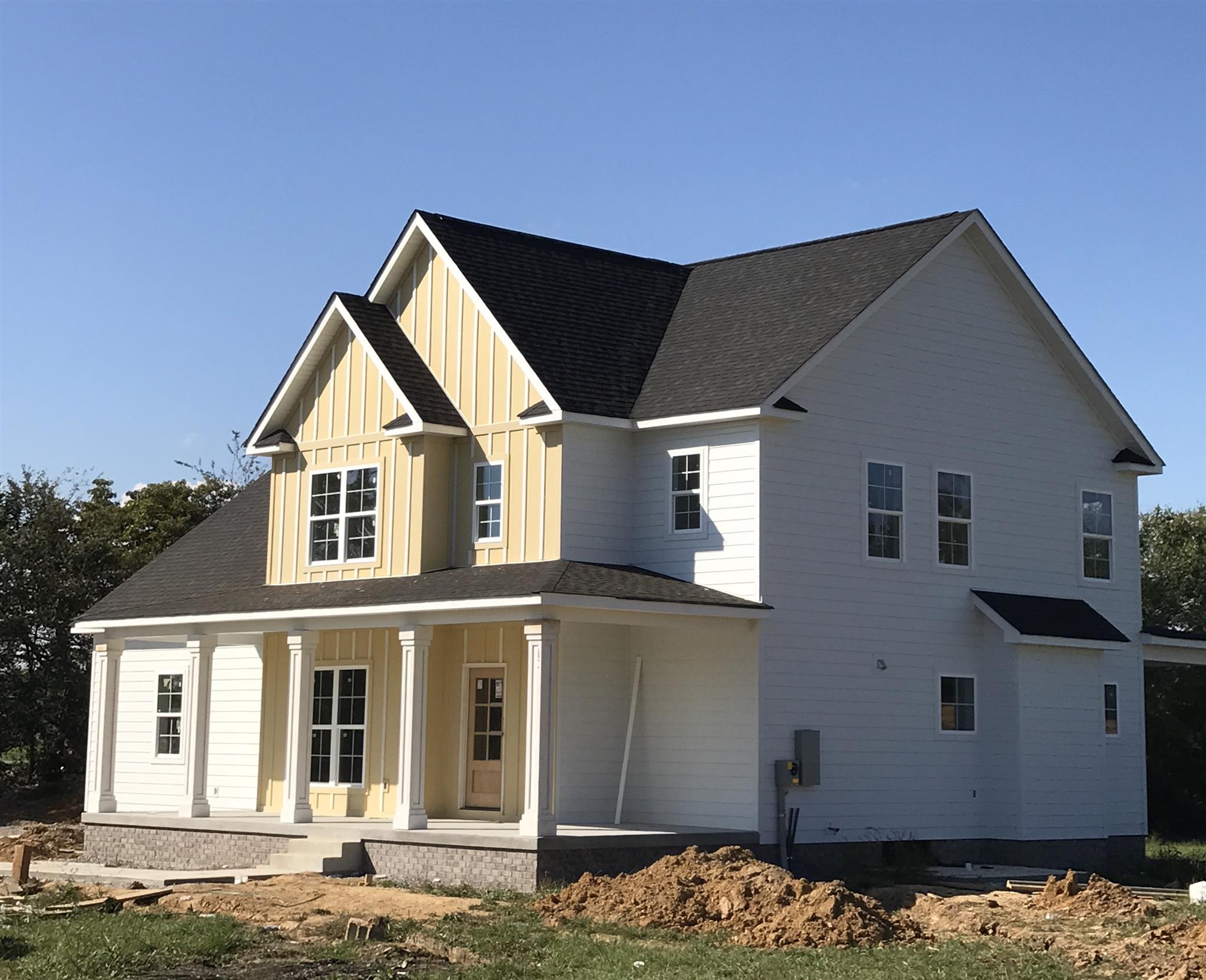 727 Philadelphia Road Lebanon, TN 37087 - Photo 1 of 16 a front view of a house with a yard