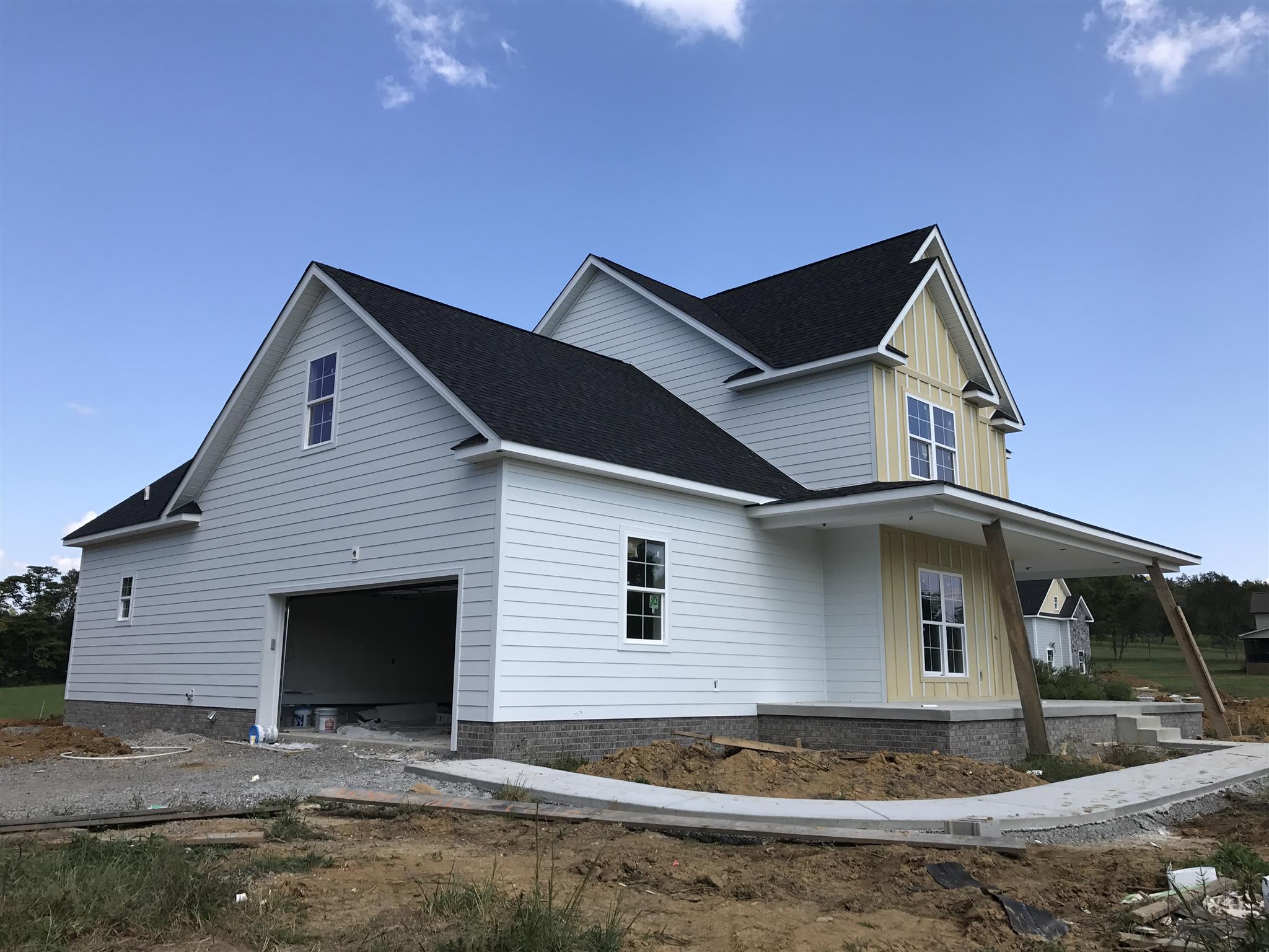 727 Philadelphia Road Lebanon, TN 37087 - Photo 3 of 16 a front view of a house with garage