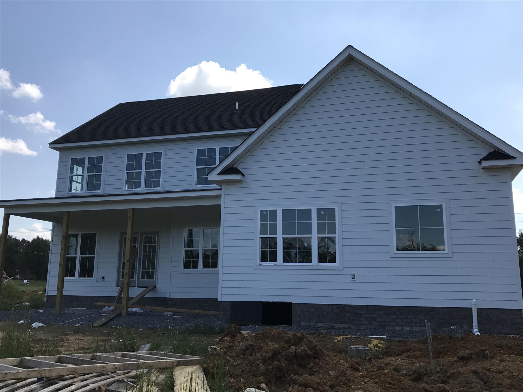 727 Philadelphia Road Lebanon, TN 37087 - Photo 4 of 16 a front view of a house with a yard