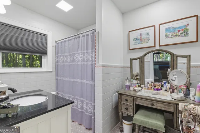 a kitchen with stainless steel appliances granite countertop a stove and a refrigerator