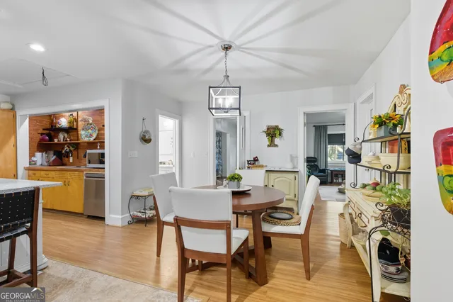 a view of a dining room with furniture window and outside view