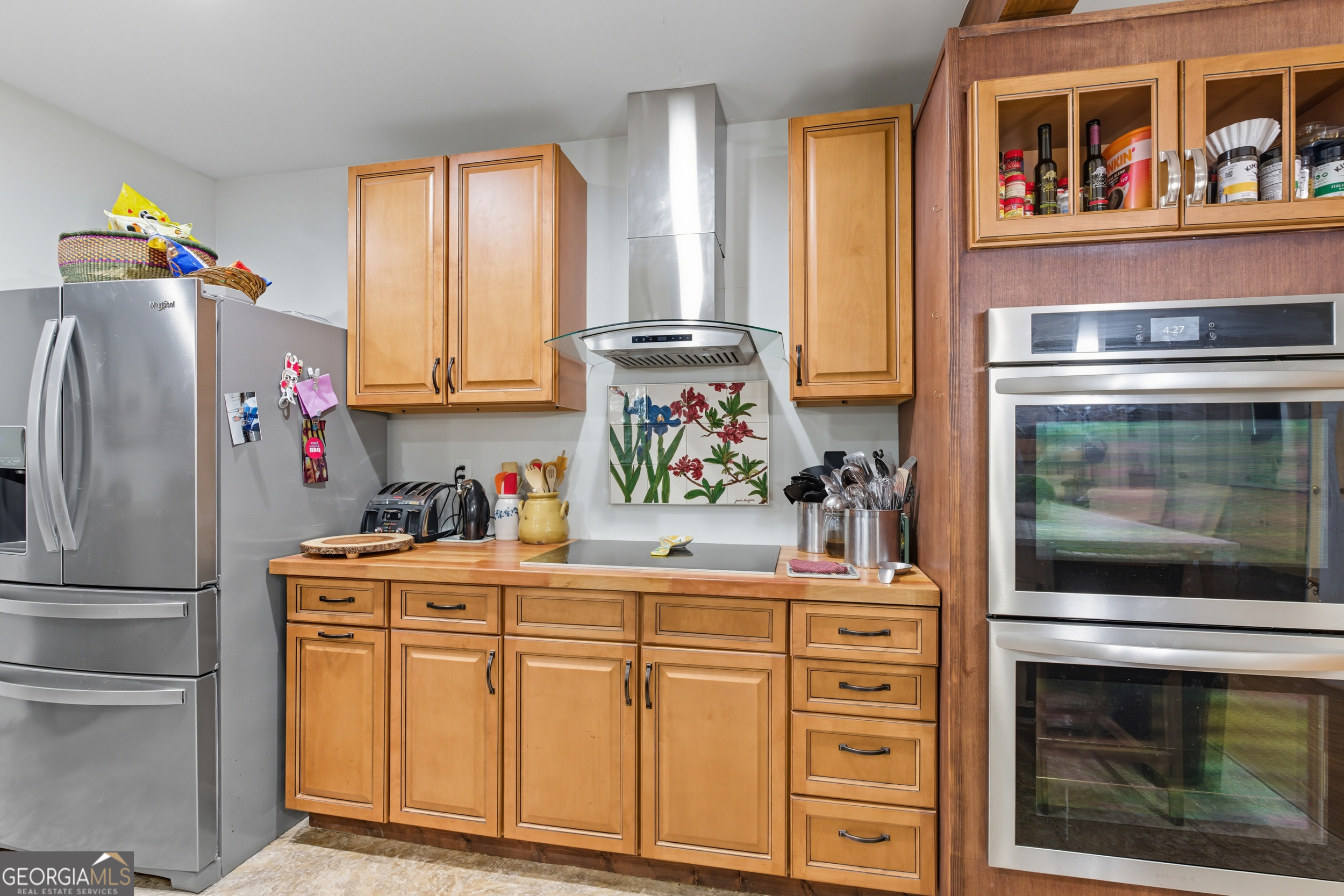 27 Rock Quarry Road Toccoa, GA 30577 - Photo 18 of 61 a kitchen with appliances cabinets and a window