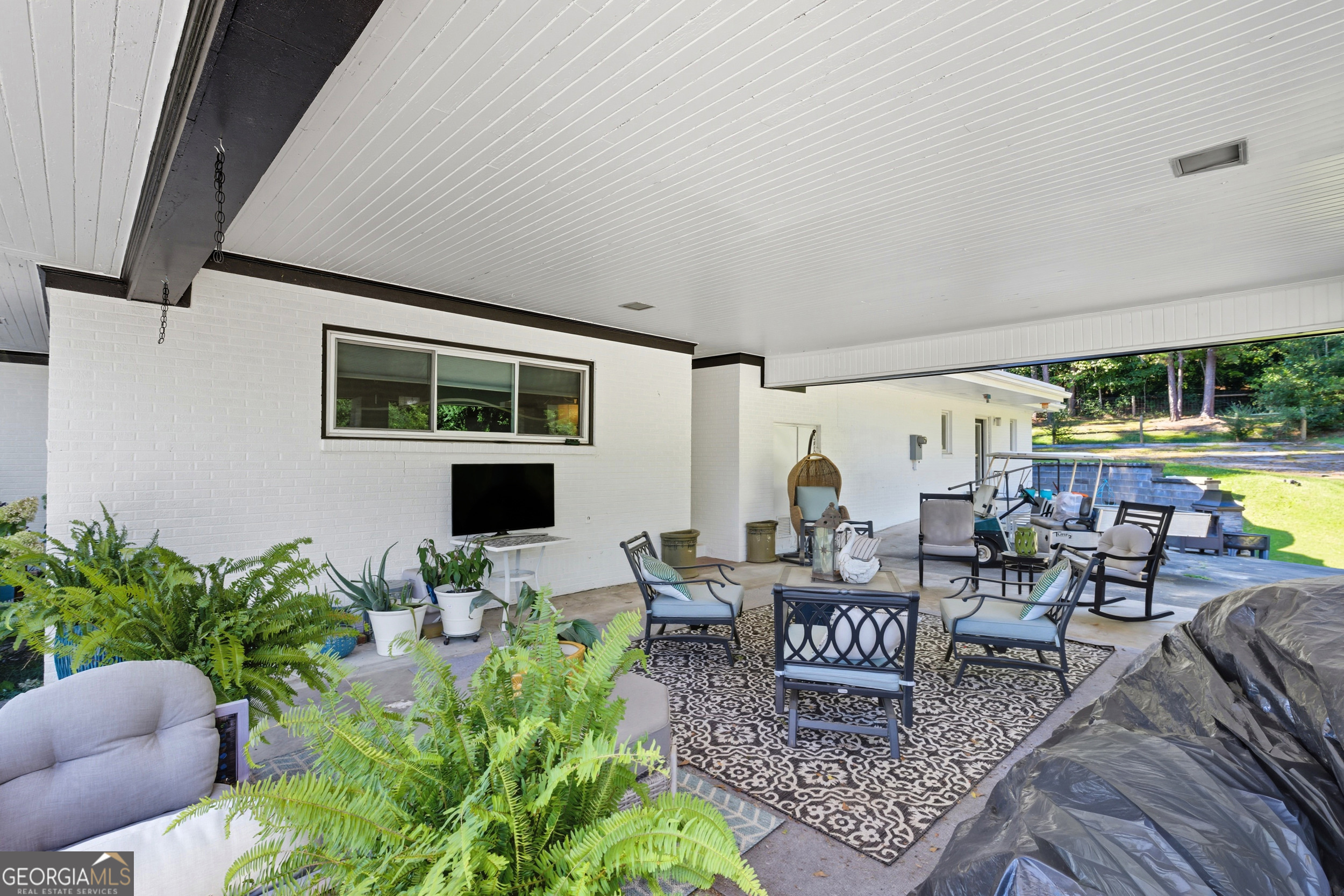 27 Rock Quarry Road Toccoa, GA 30577 - Photo 2 of 61 a living room with furniture and a large window