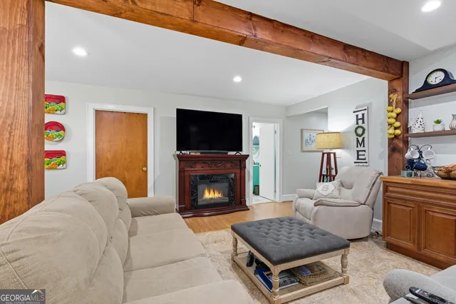 a bedroom with a bed and with furniture