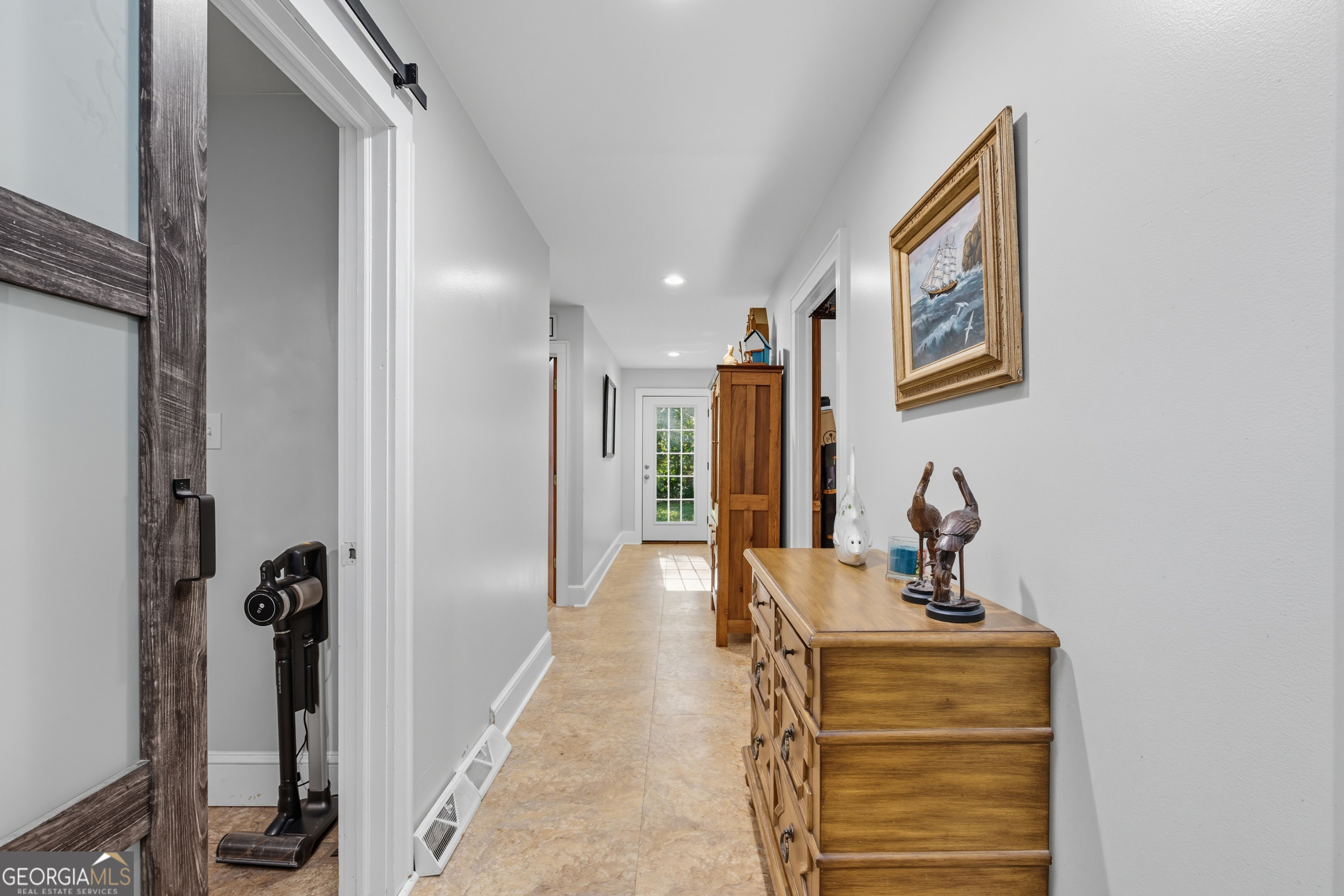27 Rock Quarry Road Toccoa, GA 30577 - Photo 27 of 61 a view of a hallway with a livingroom and furniture