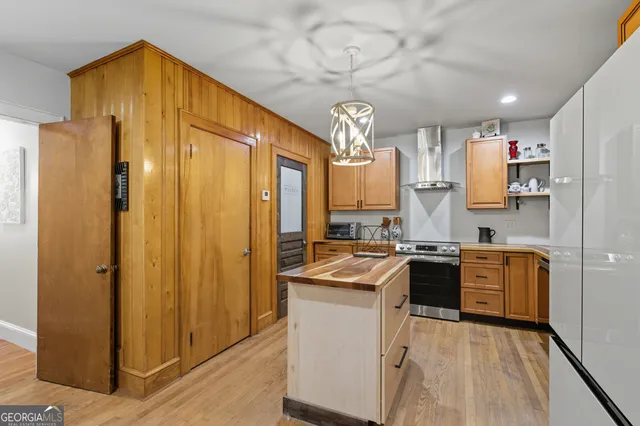 a bathroom with a double vanity sink toilet and shower
