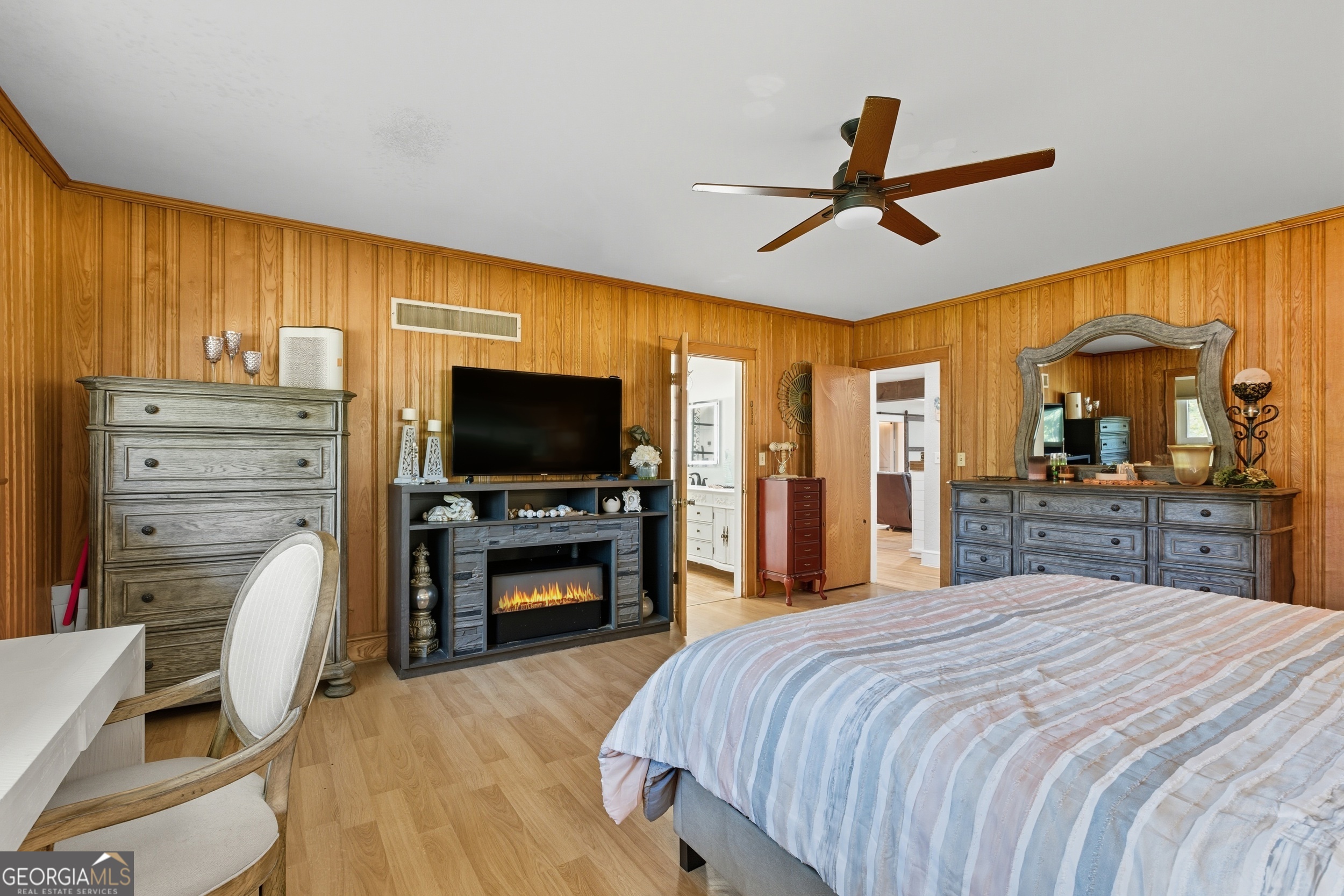 27 Rock Quarry Road Toccoa, GA 30577 - Photo 37 of 61 a bedroom with a bed and a flat screen tv