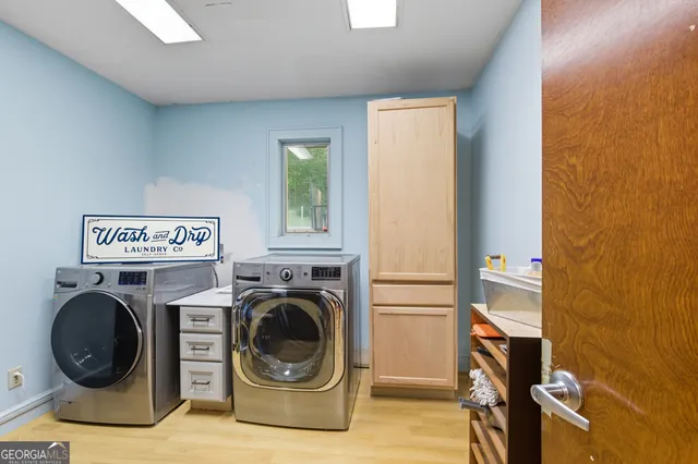 a outdoor space with patio the couches and a dining table with garden view