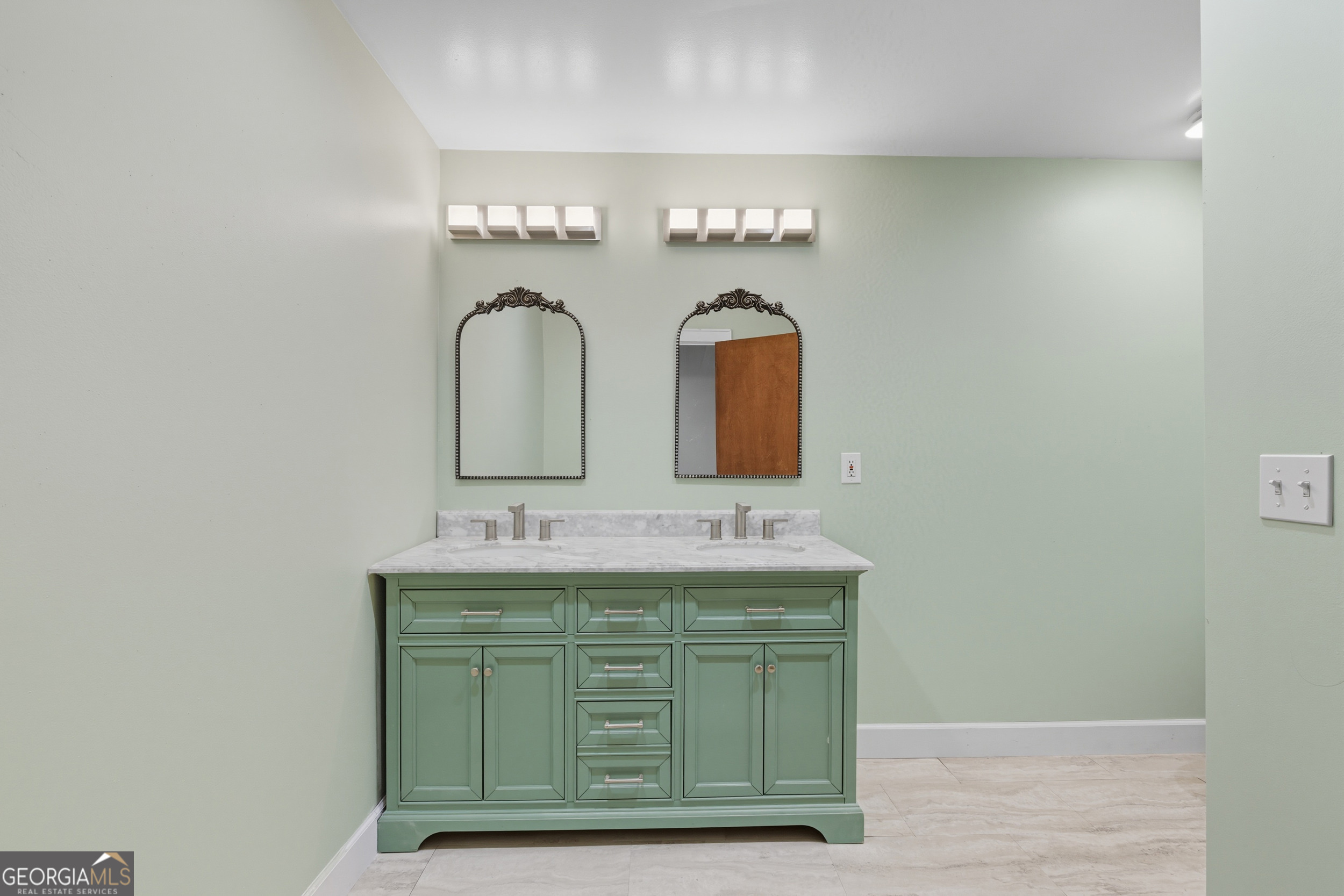 27 Rock Quarry Road Toccoa, GA 30577 - Photo 46 of 61 a bathroom with a sink and a mirror