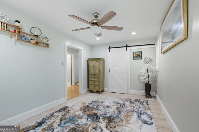 a picture of a bathroom with a shower
