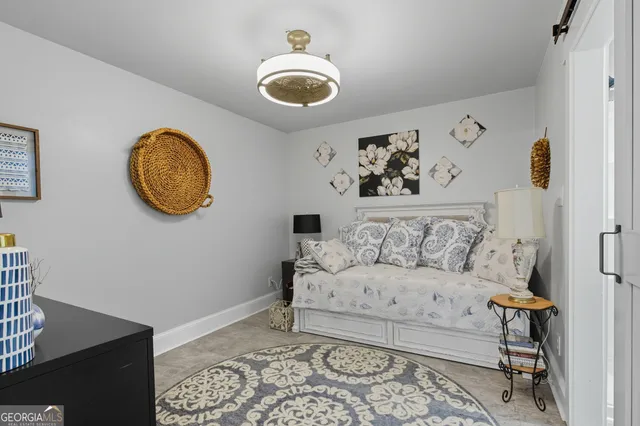 a front view of house with yard and outdoor seating