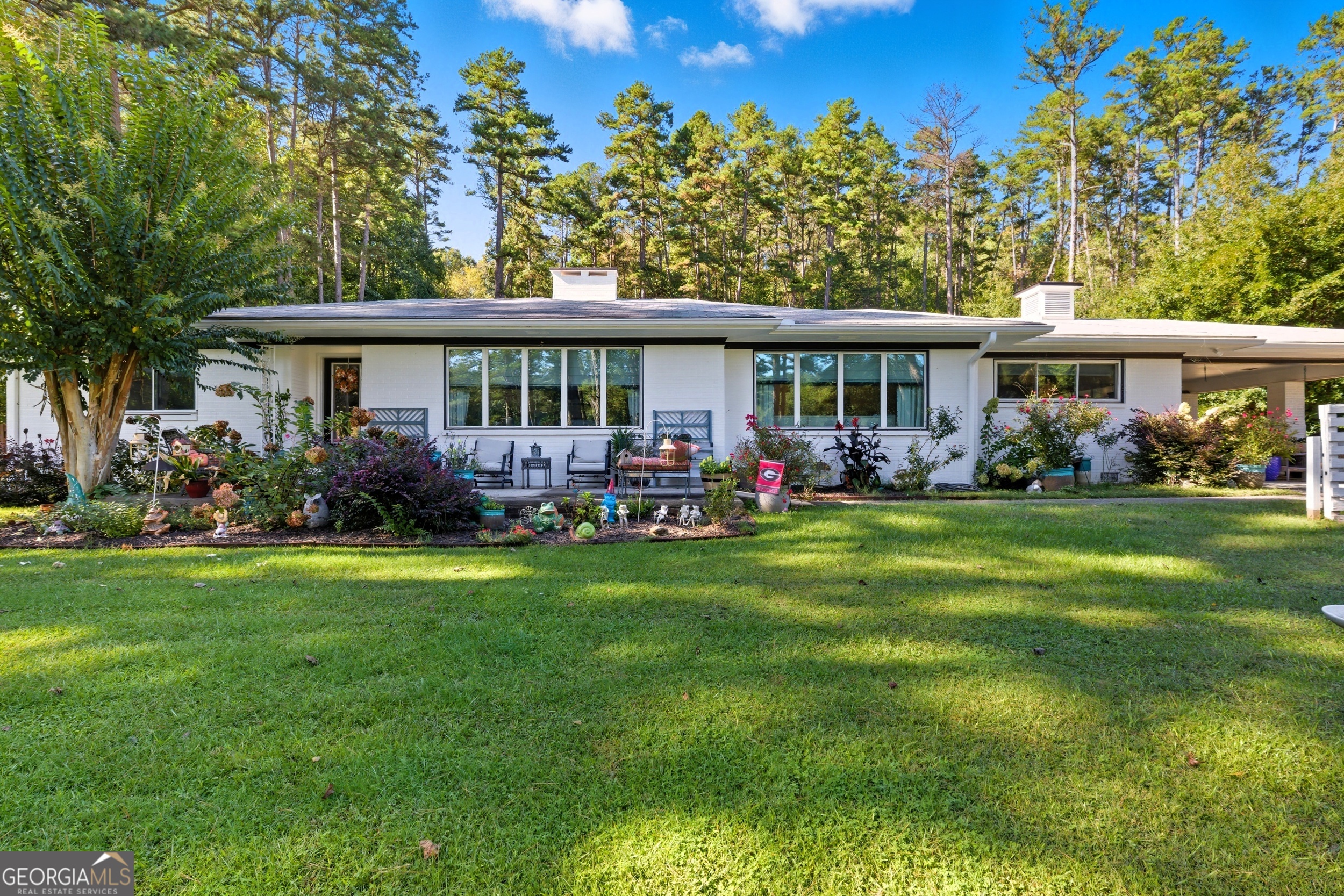 27 Rock Quarry Road Toccoa, GA 30577 - Photo 7 of 61 a front view of house with yard and outdoor seating