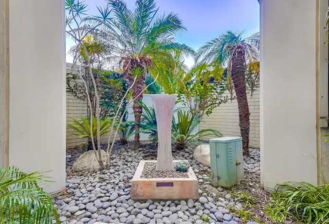 a view of a work space with furniture and wooden floor