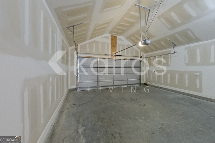 228 Western Red Cedar Drive Springfield, GA 31329 - Photo 23 of 27 a view of an empty room with white walls