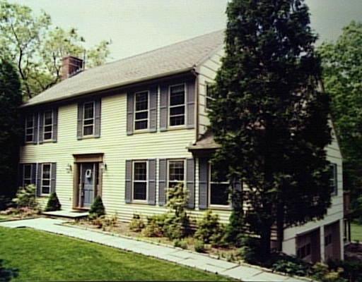 226 East Hunting Ridge Road Stamford, CT 06903 - Photo 1 of 1 front view of house with a yard