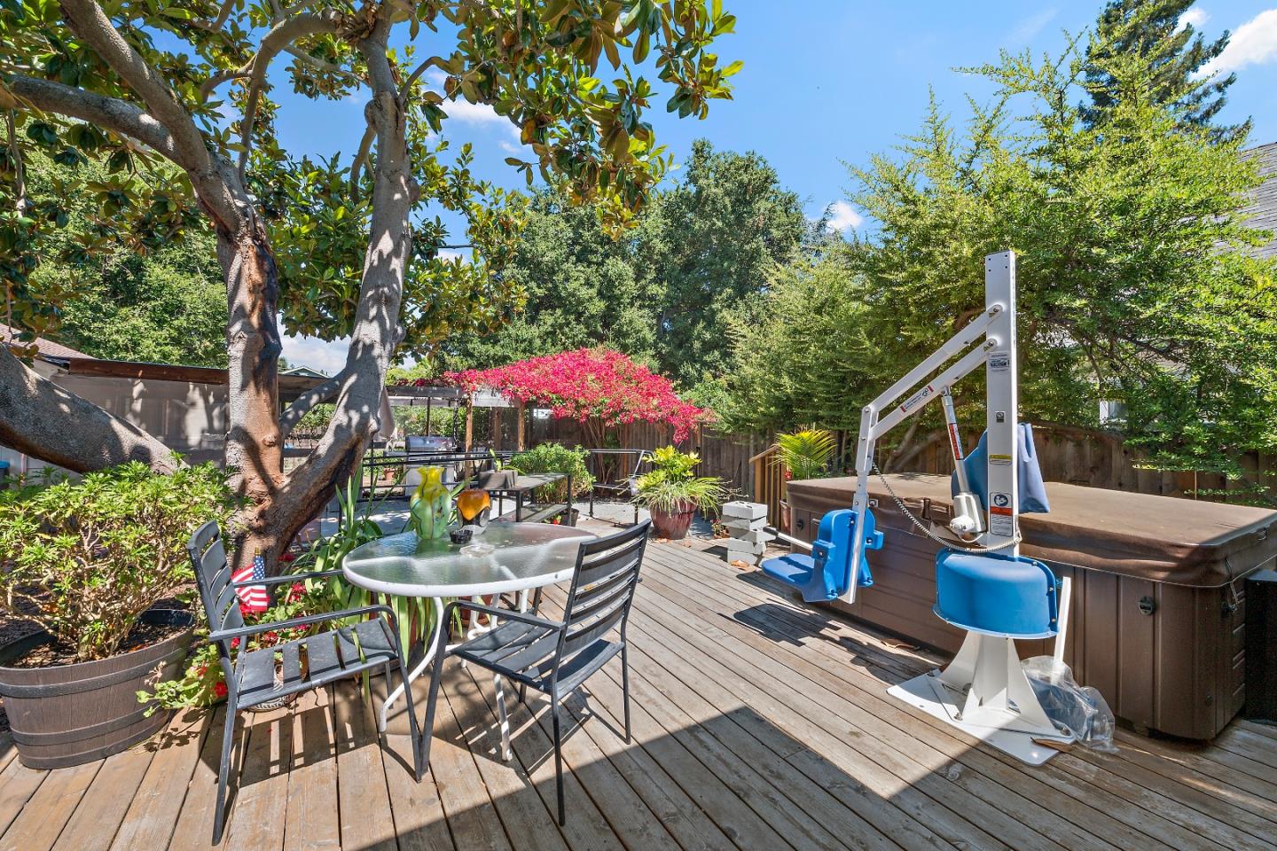 560 Franklin Street Mountain View, CA 94041 - Photo 17 of 22 a view of a chairs and table on the wooden deck
