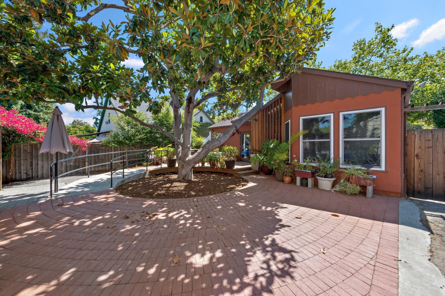 560 Franklin Street Mountain View, CA 94041 - Photo 18 of 22 a view of a house with backyard and sitting area