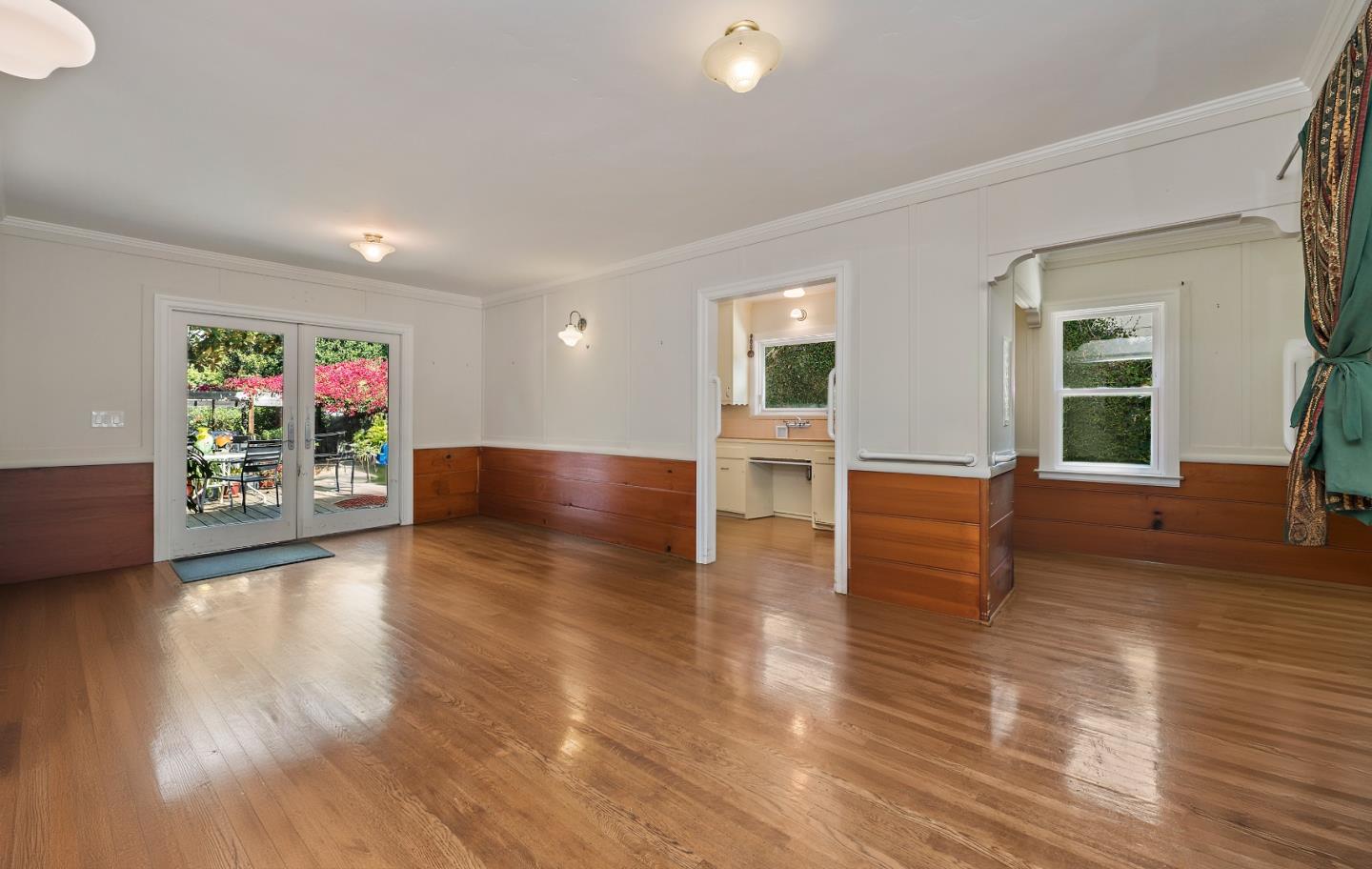 560 Franklin Street Mountain View, CA 94041 - Photo 3 of 22 a view of an empty room with window and wooden floor