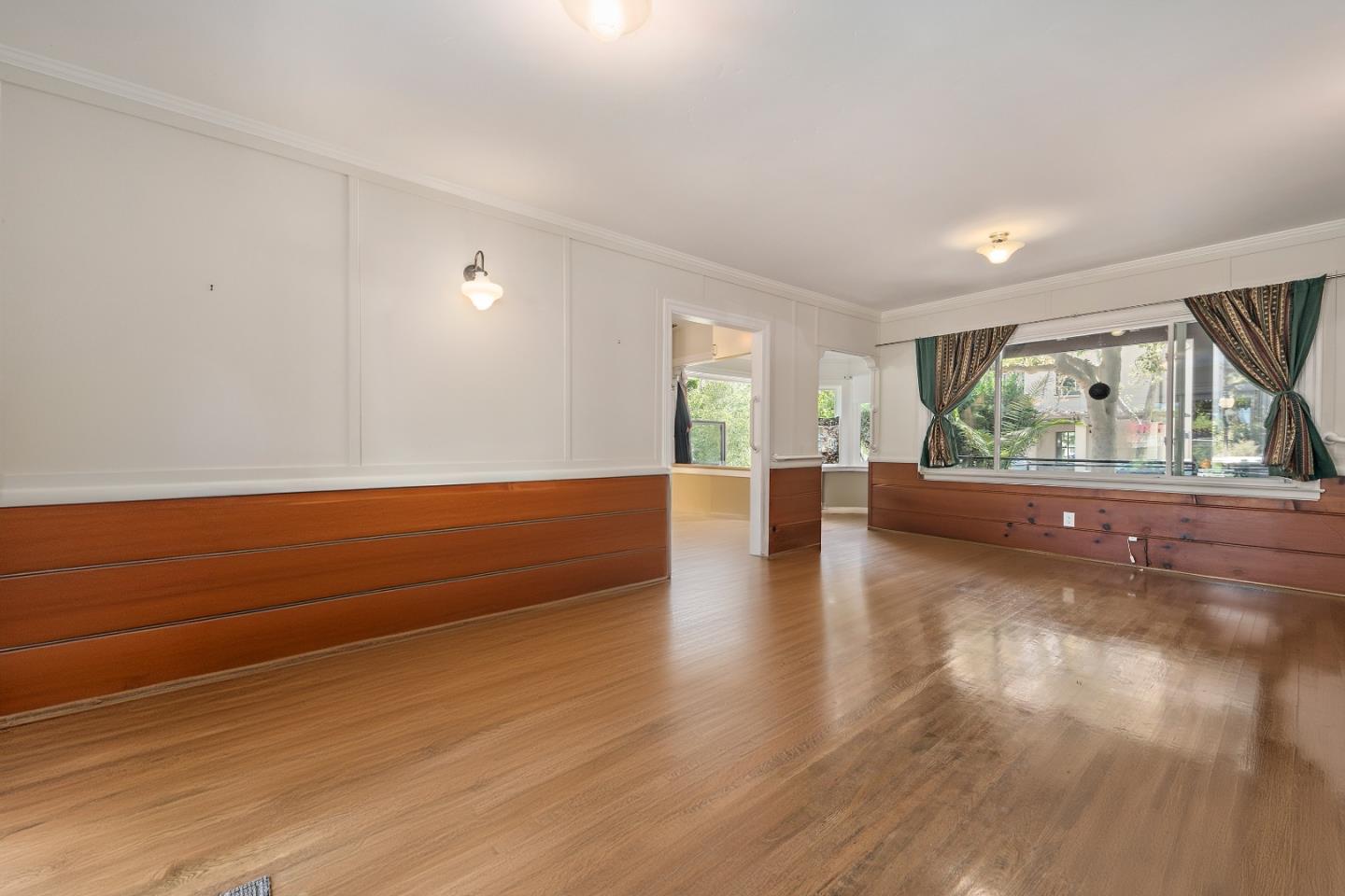 560 Franklin Street Mountain View, CA 94041 - Photo 5 of 22 a view of room with window and wooden floor
