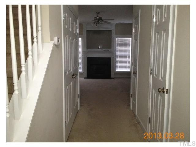 4809 Landover Pine Place Raleigh, NC 27616 - Photo 2 of 11 a view of a livingroom with a fireplace