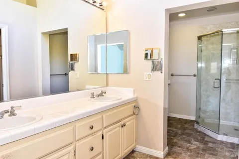 a bathroom with a sink and a mirror