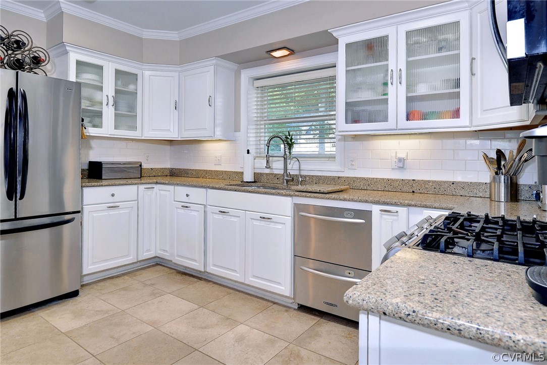 1020 Pine Hall Road Mathews, VA 23109 - Photo 12 of 49 a kitchen with granite countertop a sink stove and refrigerator