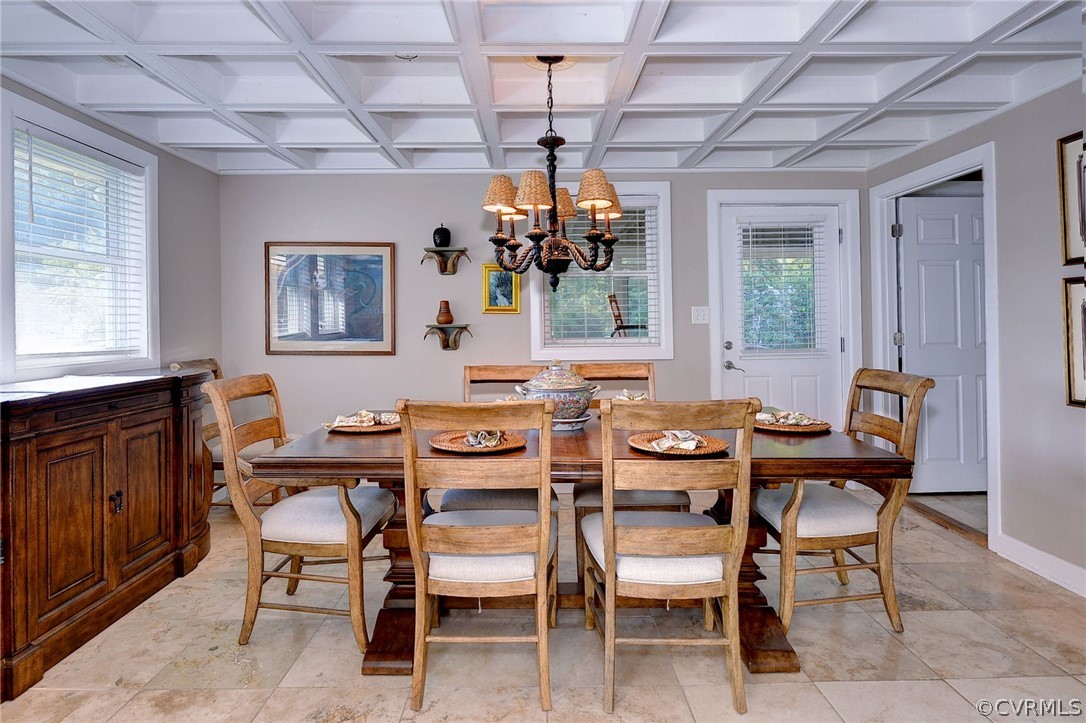 1020 Pine Hall Road Mathews, VA 23109 - Photo 13 of 49 a dining room with furniture a chandelier and window