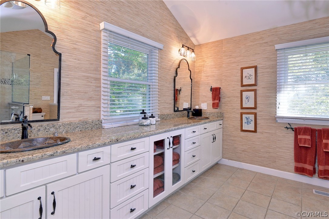1020 Pine Hall Road Mathews, VA 23109 - Photo 16 of 49 a bathroom with double sink and a large mirror