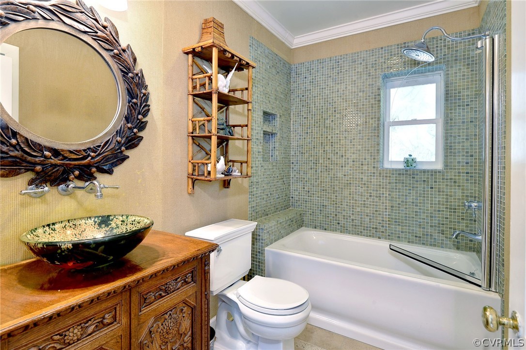 1020 Pine Hall Road Mathews, VA 23109 - Photo 19 of 49 a bathroom with a toilet a sink and a mirror