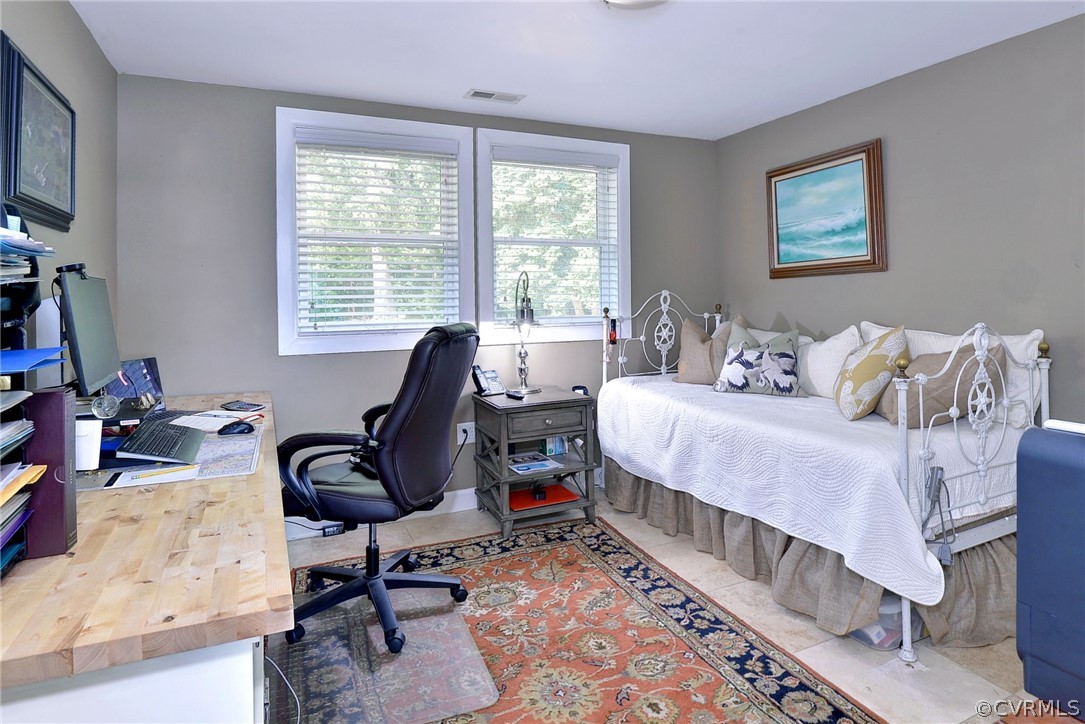 1020 Pine Hall Road Mathews, VA 23109 - Photo 20 of 49 a bedroom with bed and a window