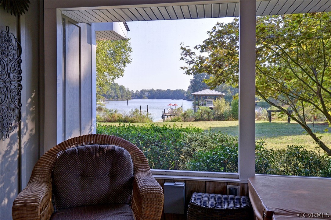 1020 Pine Hall Road Mathews, VA 23109 - Photo 22 of 49 a view of a chair and table in the balcony