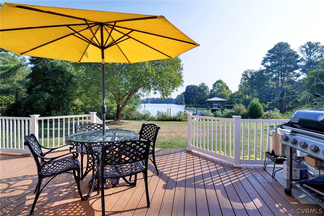 1020 Pine Hall Road Mathews, VA 23109 - Photo 23 of 49 a view of backyard with outdoor seating and wooden floor